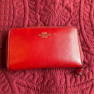 Coach zip wallet, red. See my page for matching purse if interested.
